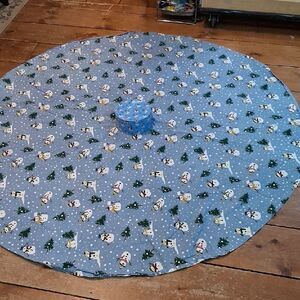 Winter tablecloth- 65" round and winter snowman tin for cookies or goodies